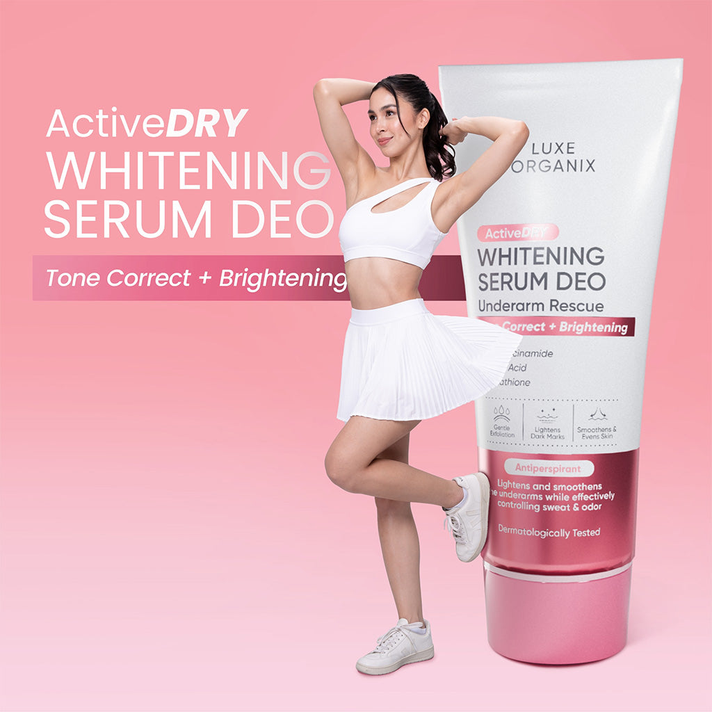 Woman holding a Luxe Organix Active Dry Whitening Serum Deo Underarm Rescue 50g product with text on a pink background