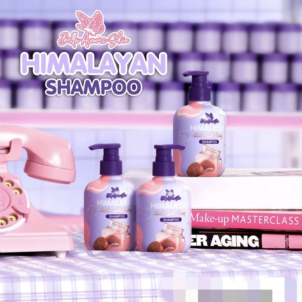 Himalayan shampoo bottles with a pink vintage phone and makeup book on a checkered background