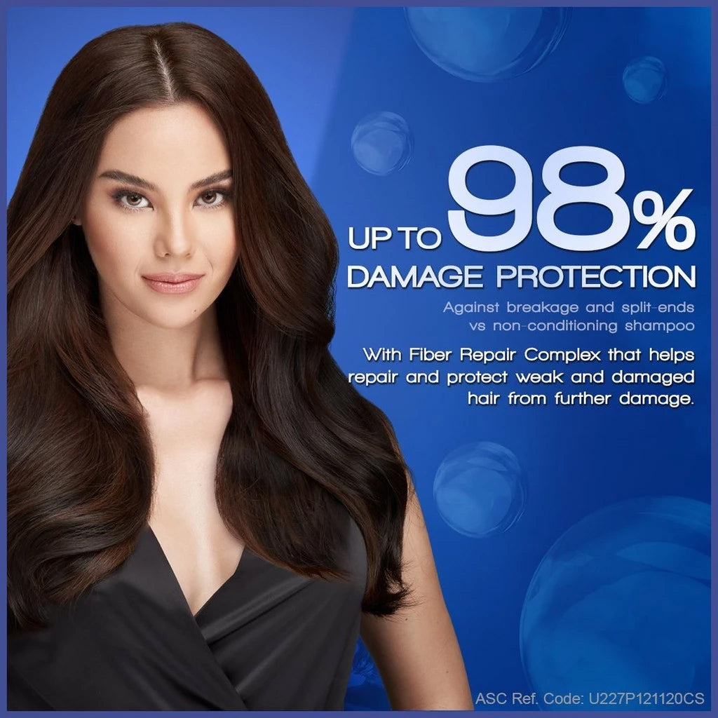 Advertisement for hair care product with a woman and text about damage protection on a blue background